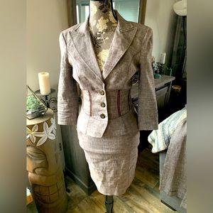 Three piece BeBe suit matching jacket, pants, and skirt